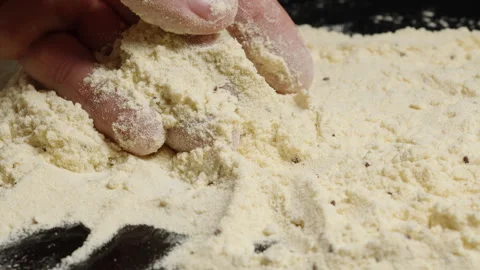 Hand Sifting Through Flour Infested with Tribolium Confusum Beetles, Tiny 動画素材 283307284