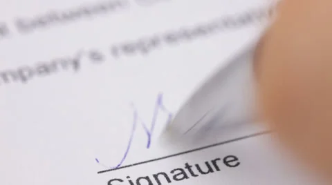 Hand signing a contract. Stock Footage 34236053
