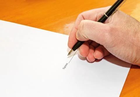 Hand signing document Stock Photos