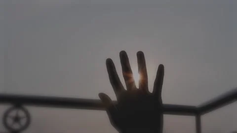 Hand In Silhouette Raised Up To The Sun 스톡 동영상 156908048