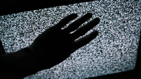 Hand Silhouette Touching Flickering TV Static Screen Stock Footage 308231745