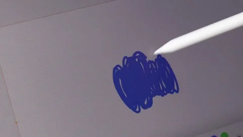 Hand sketching on a touchscreen tablet using a white digital stylus, creati.. Stock Footage 320736963