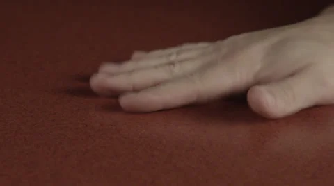 Hand slams down on table in slow motion (Close-up) 库存影片 32271636