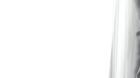 Hand slide the window curtains for warm morning light 動画素材 275652123