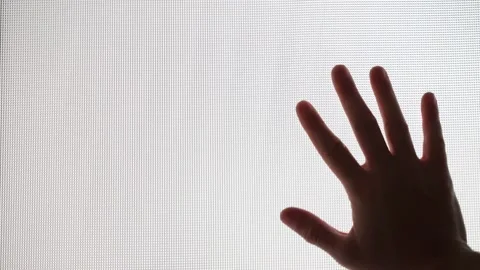 Hand slides down the white glass close-up Stock Footage 219840888