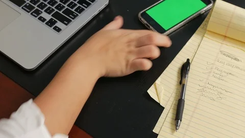 Hand slides green-screen smart phone close3  UHD4K Stock-Footage 118636045