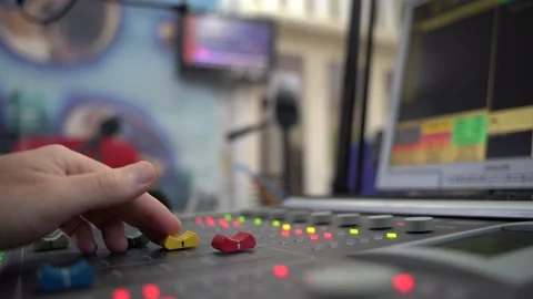 Hand Sliding Up and Down Mixer Fader on Radio Station (or Podcast) Stock Footage