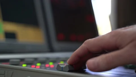 Hand Sliding Faders Up and Down at a Radio Station (or Podcast) Stock Footage 153616449