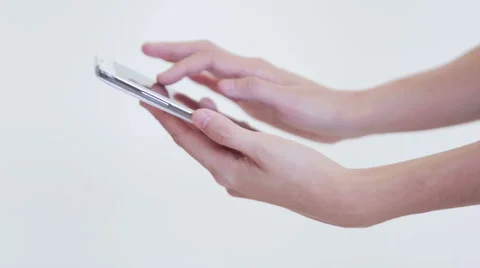 Hand with smart phone on white isolate background Stock Footage 51213533