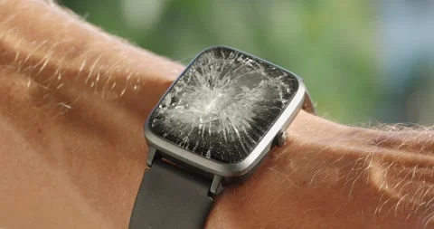 Hand with smart watch with cracked screen. Close-up. Stock Footage 265350167