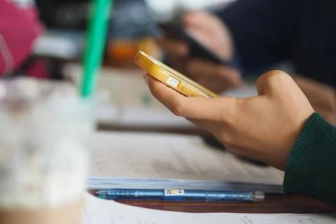 Hand with smartphone Stock Photos