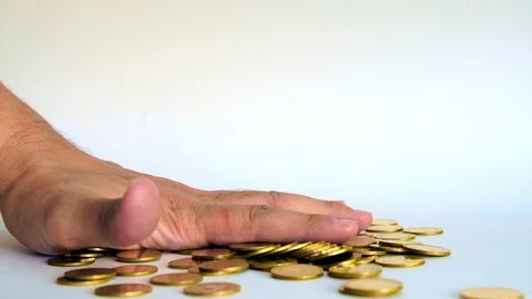 Hand smash on increasing columns of gold coins on white background, Stock-Footage 102754129