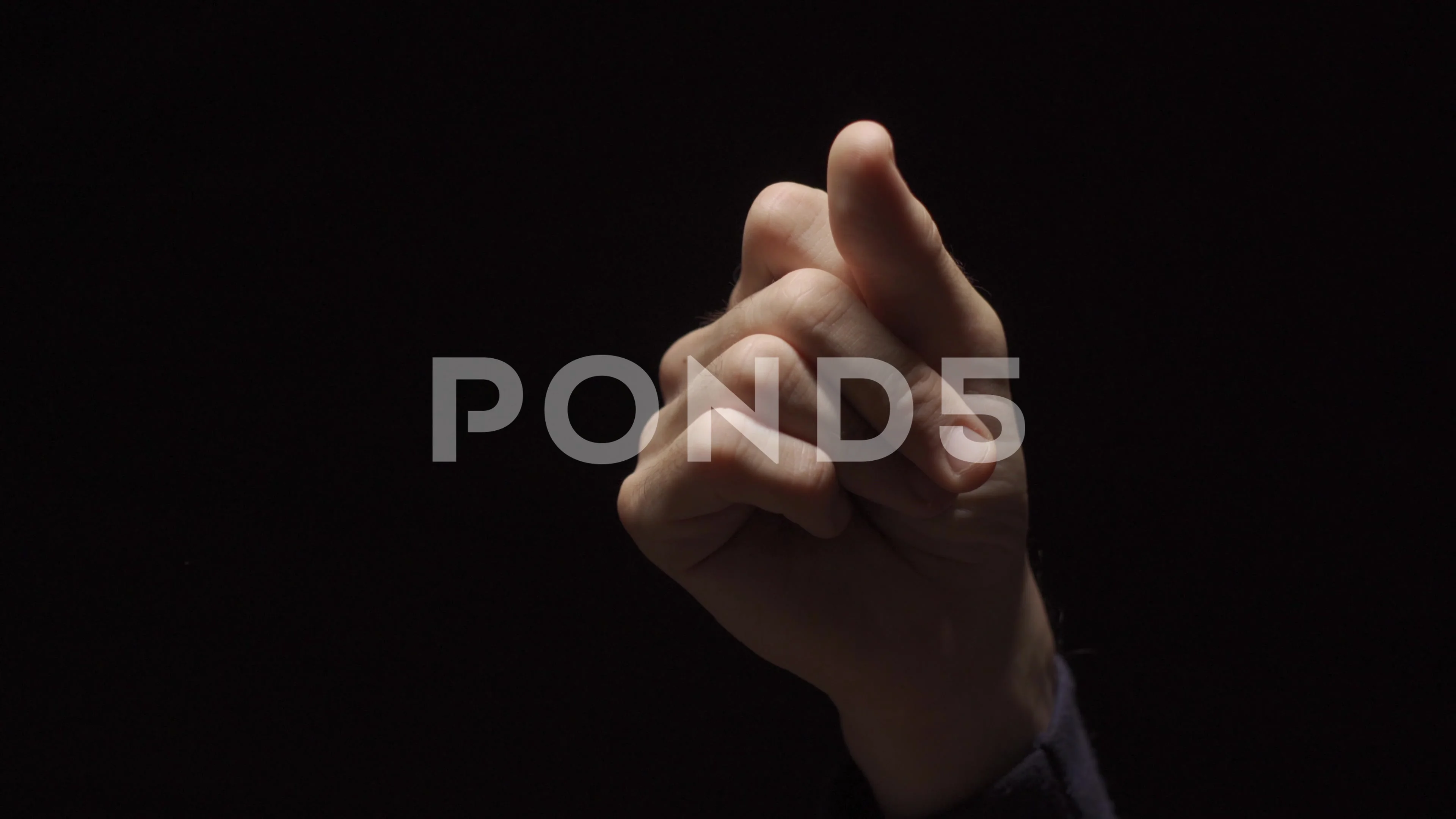 Hand snapping fingers with black background - different snaps of fingers