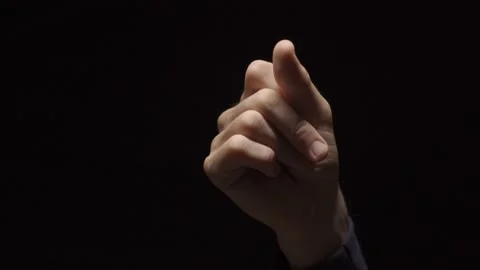 Hand snapping fingers with black background - different snaps of fingers Video stock 132258995