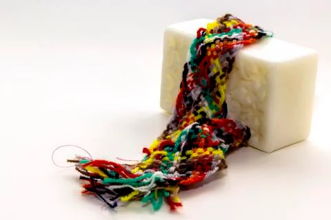 Hand soap and sewing thread Stock Photos