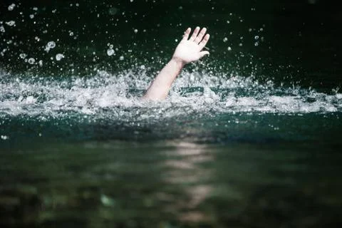 Hand of Someone Drowning and in Need of Help Stock Photos