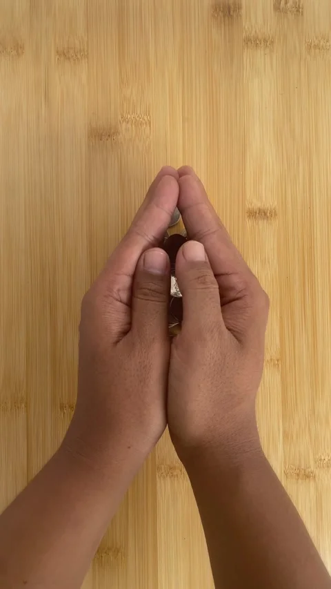 Hand Sorting Coins on Wooden Table for Savings and Budget Planning Video stock 336974095