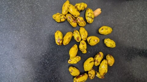 Hand sorting fresh yellow turmeric rimpang roots Stock Footage 337786083