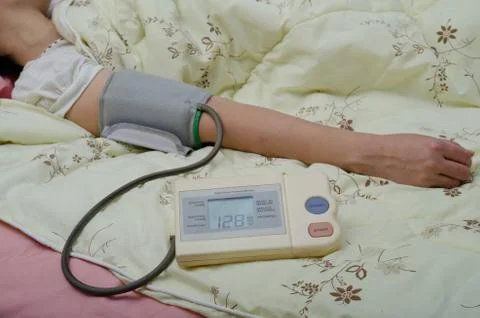 Hand with sphygmomanometer Stock Photos