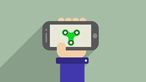 Hand spinner in the phone Stock Footage 78782969