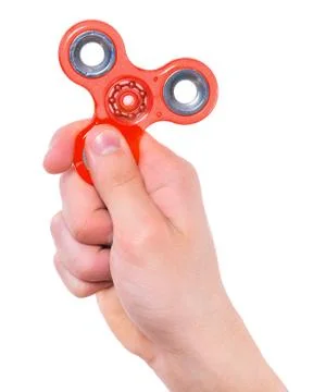 Hand with spinner toy Stock Photos