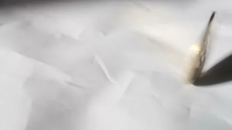 Hand Spinning Solid Gold BitCoin Until It Stops On White Background. Slow Stock Footage 172470674