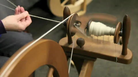 Hand spinning wool to yarn Stock Footage 22918736