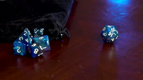 Hand spins 20 sided dice Stock Footage 201496409
