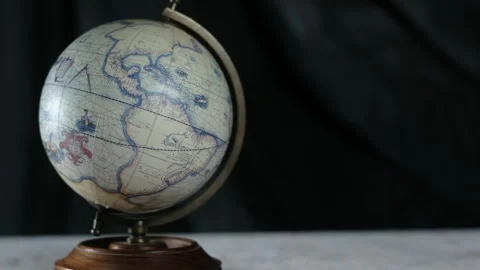 Hand spins the globe Stock Footage 257881845