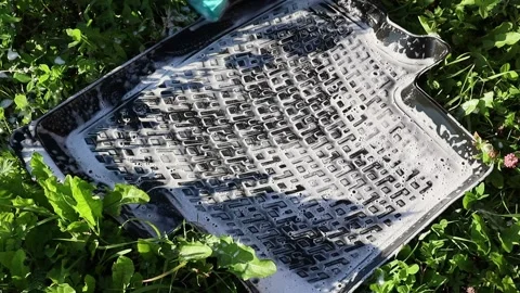 Hand with sponge washes rubber car mat, rubbing soap foam. Slow motion, FullHD Vídeos de archivo 137324714