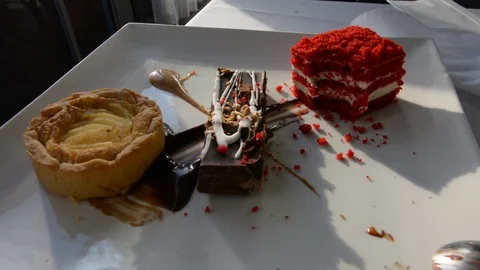  Hand with spoon takes from a cake with cherry sauce and dessert with mascarpone 스톡 동영상 102064483