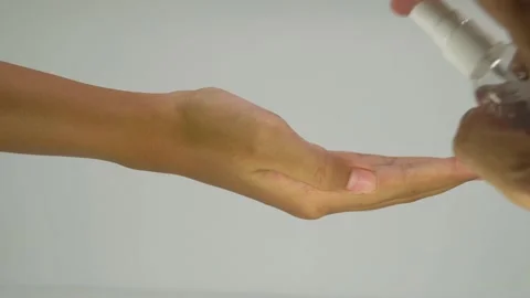 Hand spray with hand sanitizer. Selective focus. Stock Footage 164153125