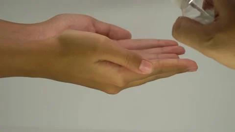 Hand spray with hand sanitizer. Selective focus. Stock Footage 164153300