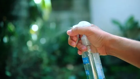 Hand Spraying Alcohol Stock Footage 160886711