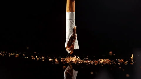 Hand squashing a cigarette | Stock Video | Pond5