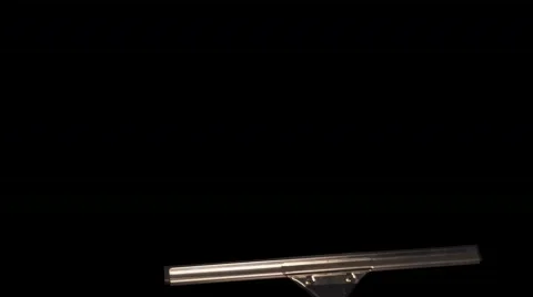 Hand with squeegee wipes screen at an angle 스톡 동영상 754624