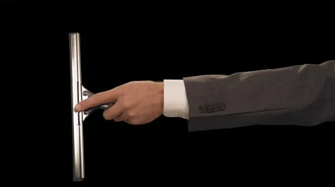 Hand with squeegee wipes screen left to right Stock Footage 754621