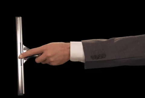 Hand with squeegee wipes screen left to right Stock Footage 754623
