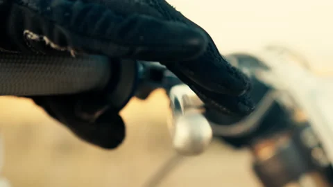 Hand squeezes motorcycle clutch Stock Footage 234496851