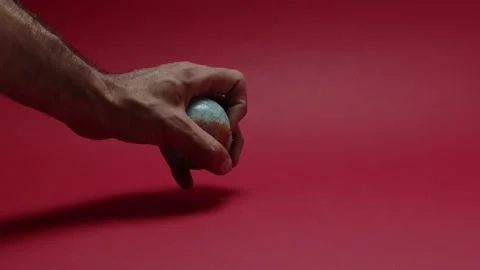A hand that squeezes a planet ball Stock Footage 198372267