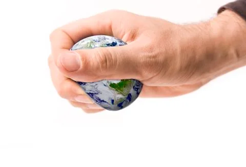 Hand squeezing earth on white Stock Illustration