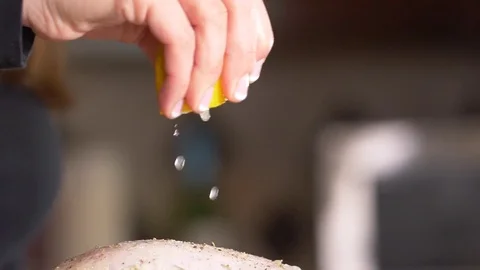 Hand Squeezing Lemon Over Turkey Stock Footage 83360127