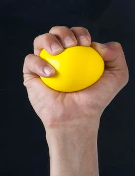 Hand Squeezing Stress Ball Stock Photos