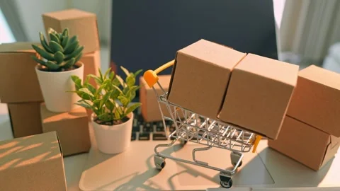 A hand stacking boxes in layers. Stock Footage 316142099