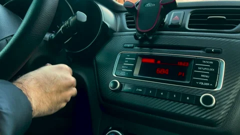 Hand starting auto engine 4k video. Stock Footage 259071374