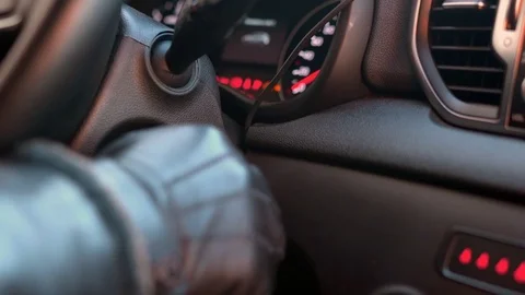 Hand starting a car engine with ignition key 스톡 동영상 72693470