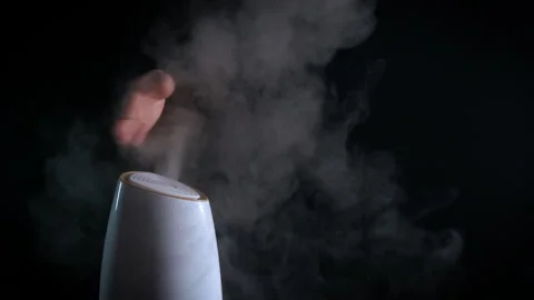 Hand in steam from air diffuser. Stock Footage 310368926