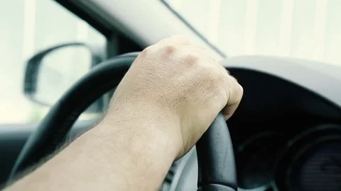 Hand on the steering wheel. Close-up 库存影片 80289137