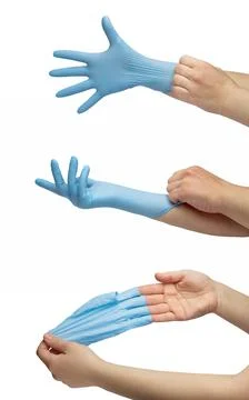 Hand step throws out blue disposable medical gloves isolated on white background Stock Photos