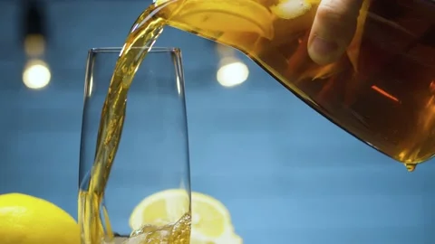 Hand stirring ice tea Stock Footage 142881012